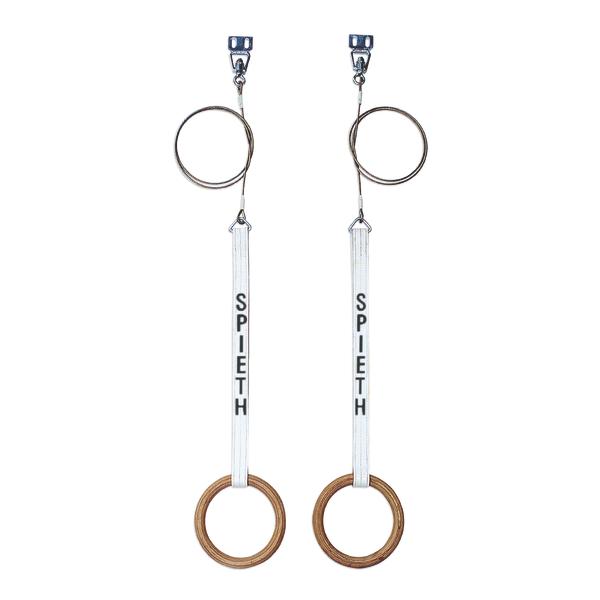 Turnringe aus Holz mit weißen Bändern und Metallringen zum Befestigen, Sportgerät für Gymnastik.